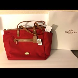 Coach diaper bag. Brand New. Red canvas